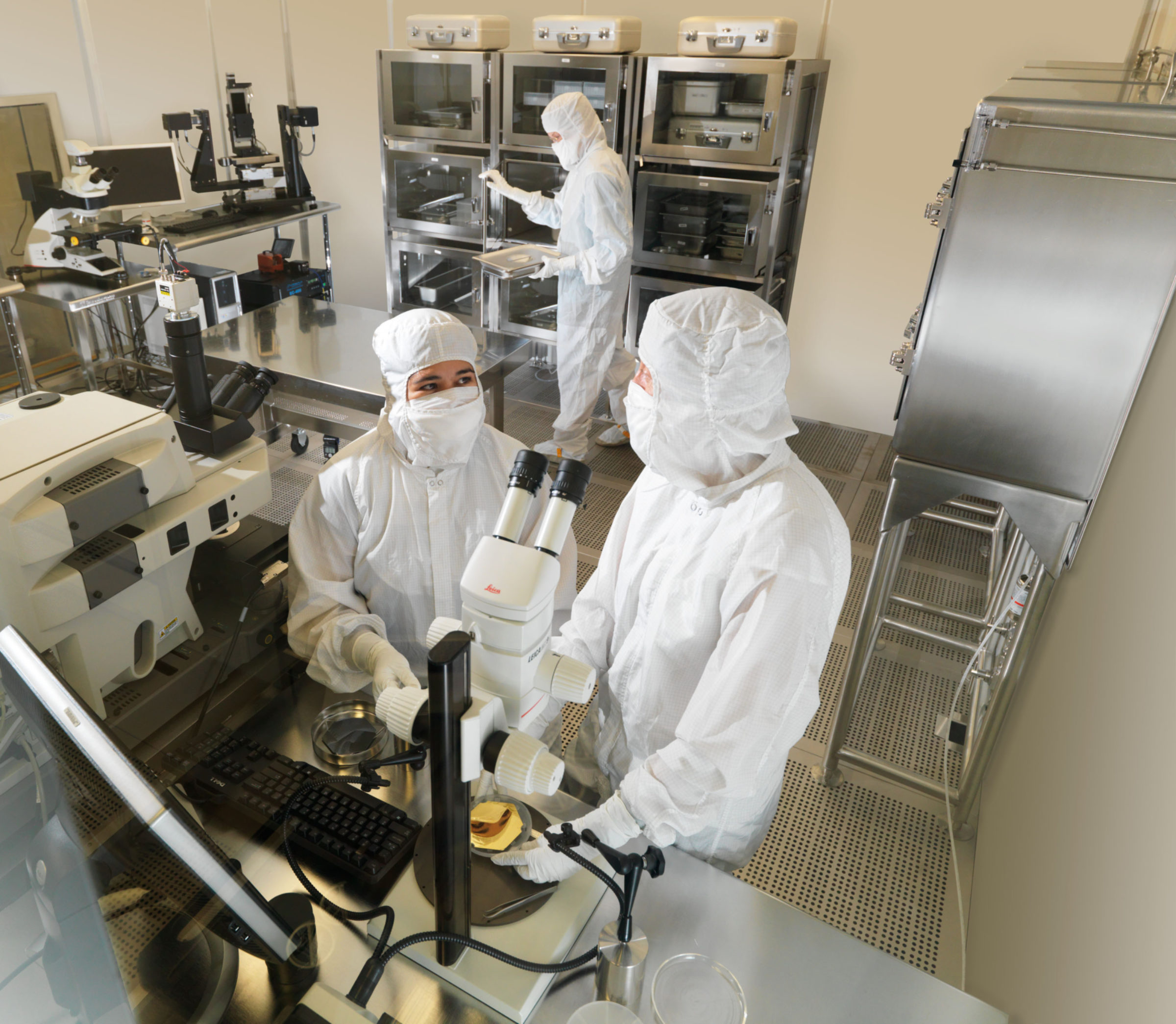 Technicians in the Genesis sample cleanroom at NASA Johnson Space Center